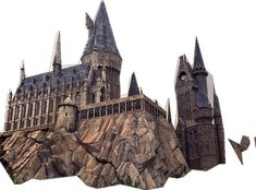 the hogwarts castle is built on top of a rock formation in front of a white sky