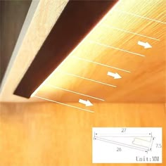 an angled view of a wooden surface with measurements for the top and bottom section, along with arrows pointing in different directions