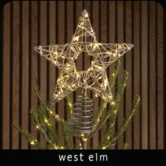 a christmas ornament with lights in the shape of a star