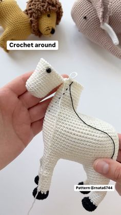 there are crocheted animals in different colors and sizes