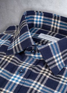 Our Alexander Sport Shirt in Multi Blue Plaid is crafted from a dreamy and highly upscale fabric, woven for us in Austria.  Crafted from pure cotton, with a super-soft cashmere-y hand, the result is a dreamy, feathery touch caressing the skin.  Elegant and timeless, this après-work look is the perfect play shirt.  The bold blues balance perfectly in this shirt, and offer a highly sophisticated casual look.  Intentional details, such as the carefully selected Flat Blue buttons and dyed-to-match R Blue Wool Collared Top, Play Shirt, Sophisticated Casual, Winter Whites, Wool Shirt, Blue Flats, Robins Egg, Sport Shirt, Work Looks