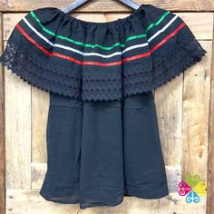 Popular peasant blouse, made with corrugated black blanket and decorated with silk ribbons. Perfect to wear for Mexican holidays like 5 de Mayo or Independence Day. Wear it off your shoulders, one shoulder, strapless or just normal. Also you can wear it loose or with a belt on the waist. So many options!. Talla/ Size Ancho Pecho/Bust (around) Largo/Lenght Chico/Small 110 cm/ 43 in 55 cm/ 21.5 in Mediano/Medium 120 cm/ 47 in 60 cm/ 23.5 in Grande/Large 125 cm/ 49 in 65 cm/ 25.5 in Folk Style Black Blouse For Festival, Black Folk Style Blouse For Festival, Folk Style Black Blouse For Summer, Black Peasant Top For Festival, Traditional Black Peasant Top For Spring, Traditional Black Tops For Spring, Black Summer Festival Peasant Top, Black Folk Style Peasant Top For Summer, Black Folk Style Summer Blouse