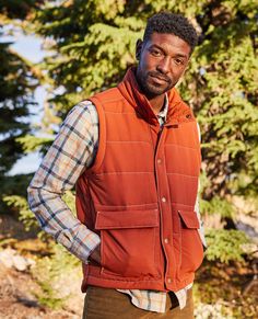 Warmth abounds in a layer-ready, flannel-lined, vintage-inspired vest made from 100% recycled contents. Front snap closures and hand pockets keep the cold air at bay so you can focus on more important things, like lookin’ good.DetailsFit: Standard fit, stand collar, drop tail, 25.5 lengthFeel: Earth friendly 100% recycled nylon with slight texture and matte finish. Interior lined with soft recycled polyester flannelFeatures: Water/wind resistant with a PFC-free DWR finish, 200 GSM recycled polye Mens Sleeve, Cold Air, Earth Friendly, Toad, Stand Collar, Focus On, Vintage Inspired, Men Sweater, Shop Now