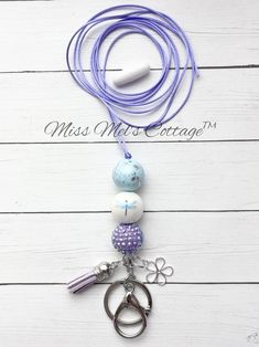 This listing is for one Dragonfly Beaded Lanyard. Made with a lobster clasp for badges, keyring, beautiful chunky 20mm acrylic beads, charm, tassel, and comfortable, strong cord.   Breakaway clasp will be included for you to add on at your desired length - very easy to do. I do not put the clasp on - this is so you can put it on the cord at the desired length you need. Instructions will be included.)  Cord length comes at approximately 46". If you would like me to put the breakaway clasp on for Personalized Purple Badge Reel As Gift, Personalized Purple Badge Reel Gift, Personalized Purple Badge Reel For Gift, Adjustable Lanyard With Lobster Clasp For Gift, Cute White Lanyards For Gifts, Adjustable White Badge Holder As A Gift, Handmade Adjustable Lanyards For Gifts, Handmade Adjustable Lanyard As Gift, Adjustable Purple Badge Holders As Gift