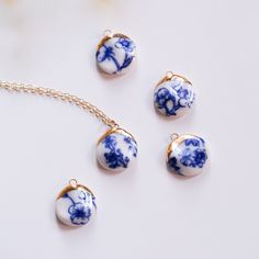 A single, shell-like style of porcelain with a varied, blue and white floral design in this coin pendant necklace. For a clean, everyday look, the white version makes for a classic statement with just enough style. The melted 22k gold is lustered on and melted in a French Tip design. This highlights the slight carved features of this porcelain necklace. Perfect for weddings but frankly, worn daily is just the right touch of sweetly unique for this mini statement piece. Chainware is 14k goldfille French Tip Dip, Clean Everyday, French Tip Design, White Floral Design, Crescent Necklace, Candy Jewelry, Coin Pendant Necklace, Blue And White Floral