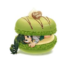 a cartoon character laying on top of a giant green doughnut with chocolate toppings