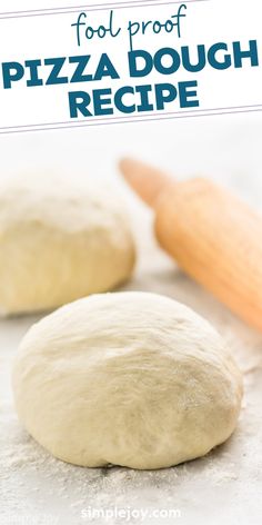 two uncooked pizza doughs sitting on top of a table