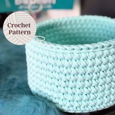 a crochet basket sitting on top of a table