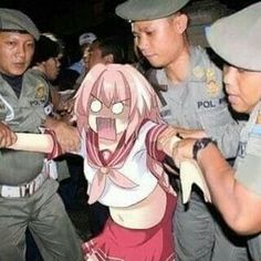 an image of a woman being held by police