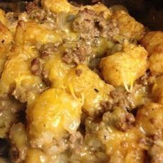 a casserole dish with meat and cheese in it