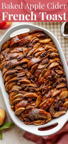 baked apple cider french toast in a white casserole dish