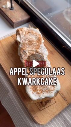 an image of a piece of bread on a cutting board with the words appel spegulas kwarkcake