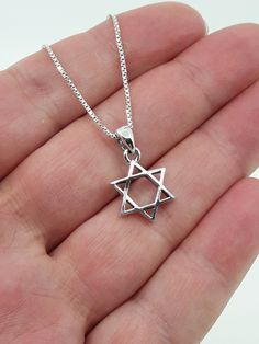 Dainty Star of David necklace small size star pendant great for boys and girls, gift for mom made from 925 sterling silver Sterling Silver Star Of David Jewelry Gift, Silver Star Of David Charm Necklace As Gift, Silver Star Of David Necklace For Gift, Silver Star Of David Charm Necklace For Gifting, Silver Star Of David Charm Necklace For Gift, Star Of David Necklace For Hanukkah Gift, Nickel-free Sterling Silver Star Of David Necklace, Hanukkah Gift Necklace With Star Of David, Silver Star Of David Necklace For Hanukkah