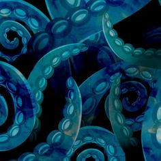 an abstract blue and black background with swirly circles in the bottom right hand corner