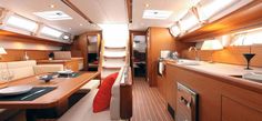 the interior of a boat with wood paneling