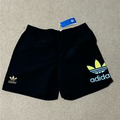 Adidas Nylon Shorts Black Colored Men’s Size Large Brand New Adidas Sports Nylon Shorts, Adidas Nylon Sports Shorts, Adidas Sporty Nylon Shorts, Sporty Black Swim Trunks With Pockets, Adidas Bottoms For Streetwear, Adidas Bottoms For Summer Streetwear, Adidas Summer Streetwear Bottoms, Sporty Black Swim Trunks For Outdoor, Casual Black Nylon Swim Trunks