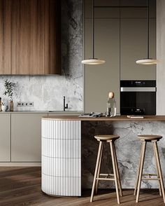 a kitchen with marble counter tops and wooden stools