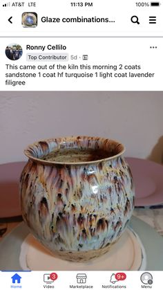 a ceramic bowl sitting on top of a table