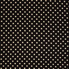 a black and white polka dot rug