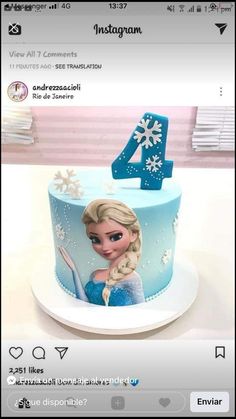 a frozen princess cake with the number four on it