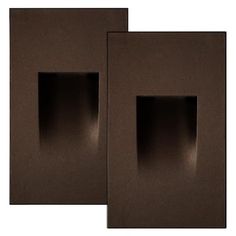 two dark brown square wall boxes with one open and the other closed