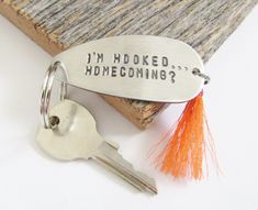 a keychain that says, i'm hooked homeconing?