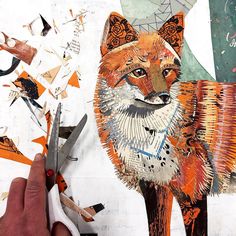 someone is cutting out an image of a fox with scissors and paper collages