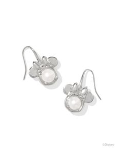 Stylish, bold, and fun, just like Disney’s Minnie Mouse herself, meet the Disney | Kendra Scott Silver Minnie Mouse Drop Earrings in Freshwater Cultured Pearl. Featuring shimmering stones in the Kendra Scott signature Davie shape, these dainty earrings are topped with her quintessential bow for an extra touch of shine. Paired with fancy fits or everyday looks, this adorable accessory is too precious to miss. Metal Rhodium Over Brass Material Freshwater Cultured Pearl Closure Earwire Size 1.23"Lx Kendra Scott Silver, Short Pendant Necklace, Fancy Fits, Antique Wedding Rings, Disney Jewelry, Initial Jewelry, Accessories Jewelry Earrings, Earring Sale, Dainty Earrings