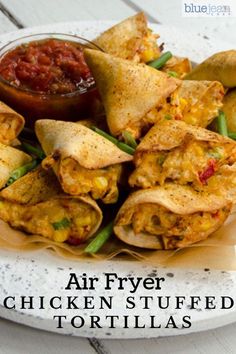 an air fryer chicken stuffed tortillas on a plate