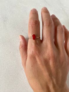 This gorgeous red coral will be set in your choice of metal: sterling silver or gold filled or solid 14k. Each ring is handmade to order in your size.  This is a natural color enhanced coral.  Please allow some variation in color and appearance.  Some of the stones may have a few white specks and a coral matrix. Coral is actually considered a gemstone.  It is composed of calcium carbonate with a trace of carotene (hence a carrot color) deposited by tiny sea creatures living in the depths of warm seas in big colonies. DETAILS:  Coral:6x8mm (small) Model wears size 7, 1.3mm gold filled band. Solid gold sales are final. Thank you Tiny Sea Creatures, Coral Stone Ring, Summer Minimal, Red Coral Ring, Carrot Colour, Ocean And Beach, Gold Ring Band, Red Gemstone Ring, Coral Ring