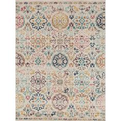 a multicolored area rug with an ornate design on the front and back side