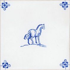 a blue and white tile with a horse standing on it's hind legs in the middle