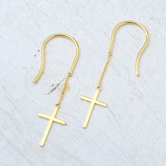 Solid gold hoop earring with a delicate dangling cross.   Size cross: 12mm long and 6mm wide Available in yellow, rose or white gold  This listing is for the dangle earring with the tiny cross, the matching sideways necklace can be found here: https://www.etsy.com/listing/1442973417/dainty-solid-gold-sideways-cross? The hoop earring with cross (last picture) can be found here: https://www.etsy.com/listing/748846117/hoop-earring-with-cross-in-14k-solid? Elegant earring, a great addition to your j Gold Cross Pendant Earrings As Gift, Gold Cross Pendant Earrings For Gift, Yellow Gold Cross Earrings For Pierced Ears, Gold Cross-shaped Pierced Earrings, Gold Cross Hypoallergenic Earrings, Gold Hypoallergenic Cross Earrings, Nickel-free Gold Cross Earrings, Gold Nickel-free Cross Earrings, Minimalist Gold Cross Earrings