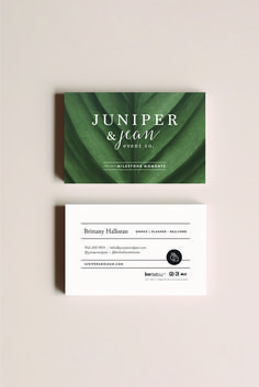 the business card is designed to look like a green leaf with white lettering on it