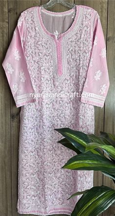 Soft cotton hand embroidered Kurta in a pretty pink color ! Paired with soft cotton lined pants in white. Sold separately. Kurta Length:46 inches Liner included Pink Cutwork Sets For Festive Occasions, Festive Pink Cutwork Sets, Festive Pink Kurta With Cutwork, Pink Block Print Sets With Long Sleeves, Festive Pink Cutwork Kurta, Pink Long Sleeve Block Print Sets, Pink Long Sleeve Sets With Block Print, Spring Pink Kurta With Cutdana, Pink Chikankari Embroidery Set For Spring