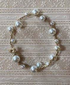 "Assorted glass pearls woven together with hemp string. To clasp, poke the large bead on one end through the loop on the other end and tighten as needed. 🥥🤍 SIZE: 9\" in length (adjustable)  MATERIALS: hemp string, glass beads" Woven Bracelet, The Loop, Beach Jewelry, Pearl Beads, Glass Beads, Jewelry Bracelets, Braids, Beaded Bracelets, Bracelet