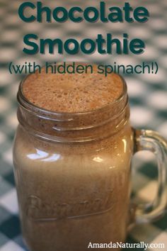 chocolate smoothie with hidden spinach in a mason jar on a checkered tablecloth