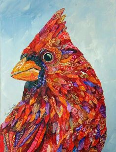 a painting of a colorful bird made out of different colored fabrics and fabric materials