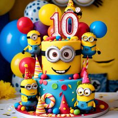 a birthday cake decorated with minion characters and balloons in the shape of an 10