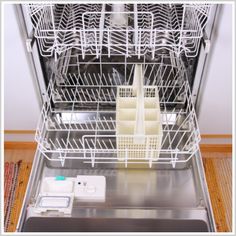 a dishwasher with the words clean your dishwasher naturally