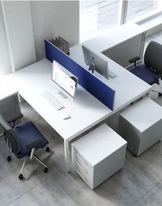 an office cubicle with two desks and one chair, all in white and blue