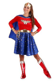 a girl in a wonder costume posing for the camera