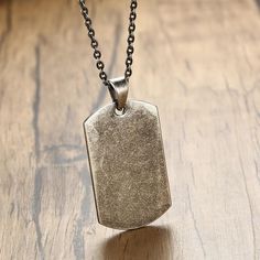 The Dog Tag Pendant Necklace Oxidized is an elegant piece of jewellery created from oxidized stainless steel that is durable and won't tarnish over time. This elegant necklace features a rectangle shape pendant with a minimalistic stainless steel chain that will go well with any casual or formal outfit. Materials: Stainless Steel Dimensions: Pendant: 0.9 * 1.6 in / 2.3 * 4 cm Necklace Length: 19.6 in / 50 cm Military Dog Tag, Military Dog, Dog Tags Military, Dog Tag Pendant, Bracelet Viking, Metal Tags, Us Military, Necklace For Men, Military Inspired