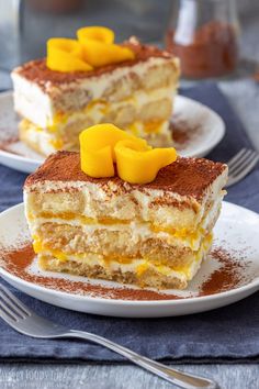 two pieces of cake sitting on top of white plates