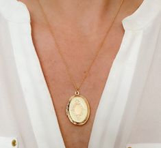 "Large Locket necklace, oval Locket necklace, gifts for her, birthday gift, vintage look locket, gold plated locket necklace, jewelry, gifts *Large Oval shaped locket suspended on dainty gold plated cable chain *Oval locket pendant is approx 1.25\", inside size is approx 7/8\" *Chose your perfect length SHIPPING: *Free domestic shipping on all orders PACKAGING: *All pieces come beautifully packaged, perfect for gift giving. Find more to ❤️ here: http://etsy.com/shop/thejewelrystandard" Orders Packaging, Oval Locket Necklace, Locket Gold, Large Locket, Gifts For Her Birthday, Oval Locket, Tarnished Jewelry, Medallion Necklace, Opal Necklace