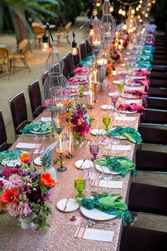 a long table with many plates and place settings