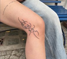 a person with a tattoo on their arm