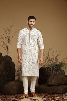 Macaroon Yellow and Starlight White And Blue Floral Printed Cotton Kurta Set Kurta Set Traditional  Wear  Care Instructions: Dry Clean Floral Printed Cotton kurta with motifs & front stitch placket. Top Details: Color- Yellow or White/Blue, Fabric - Blend Cotton Bottom Details Color - Ivory, Style - free size Chudidar, Fabric -Dhupion Silk Package Include: Kurta and Pajama Additional Information : - As this Sherwani/Waistcoat/Kurta is stitched & made as per orders requested only, So there is NO Bollywood Style Multicolor Kurta With Dabka Details, Bollywood Style Multicolor Kurta With Dabka, Bollywood Style Multicolor Dabka Kurta, White Bandhani Print Semi-stitched Kurta, Multicolor Straight Kurta For Eid, White Straight Kurta With Bandhani Print, White Bandhani Print Straight Kurta, Wedding Eid Kurta With Printed Motifs, Eid Multicolor Straight Kurta