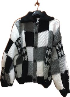 Trendy White Patchwork Sweater, White Long Sleeve Patchwork Cardigan, Oversized Black Patchwork Sweater, Gray Patchwork Sweater For Winter, Cozy White Patchwork Outerwear, Winter Black Patchwork Cardigan, Black Patchwork Cardigan For Winter, Black Patchwork Cardigan For Layering, Black Patchwork Cardigan For Fall