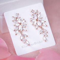 "Very romantic crystal bridal earrings. Gorgeous crystal wedding earrings for bride or bridesmaids. Matching necklace and bracelet will complete your bridal jewelry set. This wedding jewelry set is available in silver, gold or pink gold(rose gold) color to match your dress. They measure about 1 1/2\" long and 1/4\" wide. Matching regular bracelet is measuring: 7\" long and 1/4\" wide or adjustable bracelet option is available as well to fit a larger wrist. High quality guaranteed by GlamourBride Wedding Crystal Drop Earrings, Rose Gold Crystal Bridal Earrings For Wedding, Glamorous Rose Gold Jewelry For Wedding, Rose Gold Cubic Zirconia Bridal Earrings For Wedding, Glamorous Rose Gold Wedding Jewelry, Rose Gold Crystal Jewelry For Wedding, Rose Gold Crystal Drop Bridal Earrings, Elegant Crystal Bridal Earrings For Bridesmaid Gift, Rose Gold Crystal Earrings For Anniversary